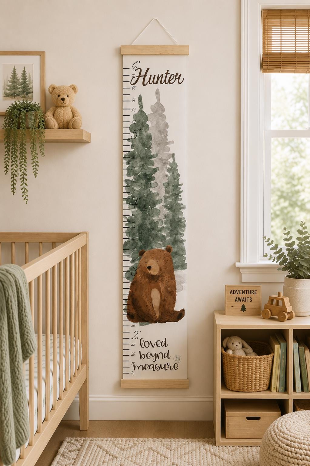 Personalized woodland growth chart hanging in kids nursery