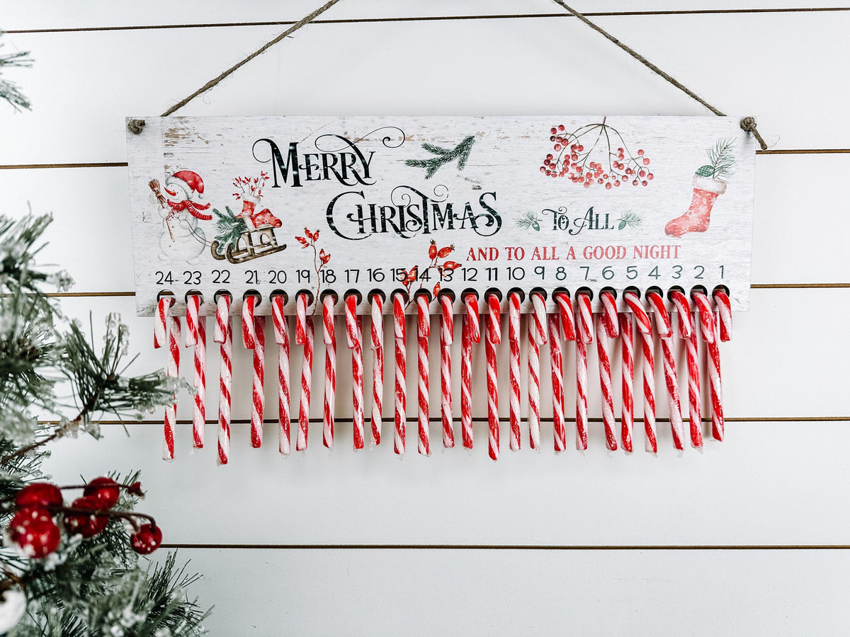 Merry Christmas wooden candy cane advent calendar with snowman and sleigh