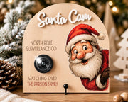 North Pole Santa Cam sign with personalized family name and camera lens