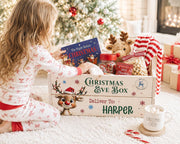 Personalized Christmas Eve crate with pajamas books and holiday treats
