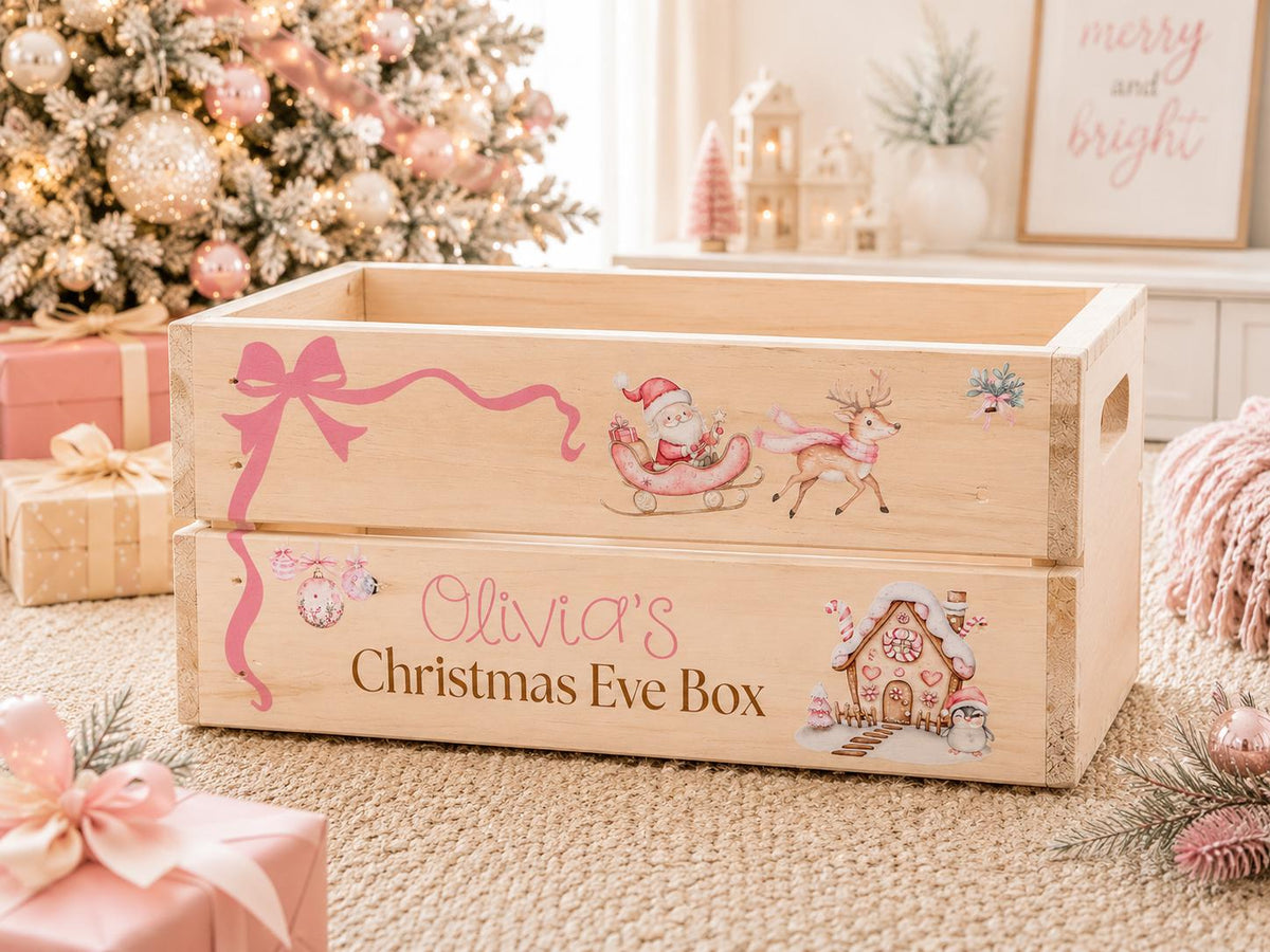 Wooden Christmas Eve box with pink bow Santa reindeer and gingerbread house